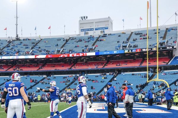 Buffalo Bills players near end zone sidelines at New Era Field