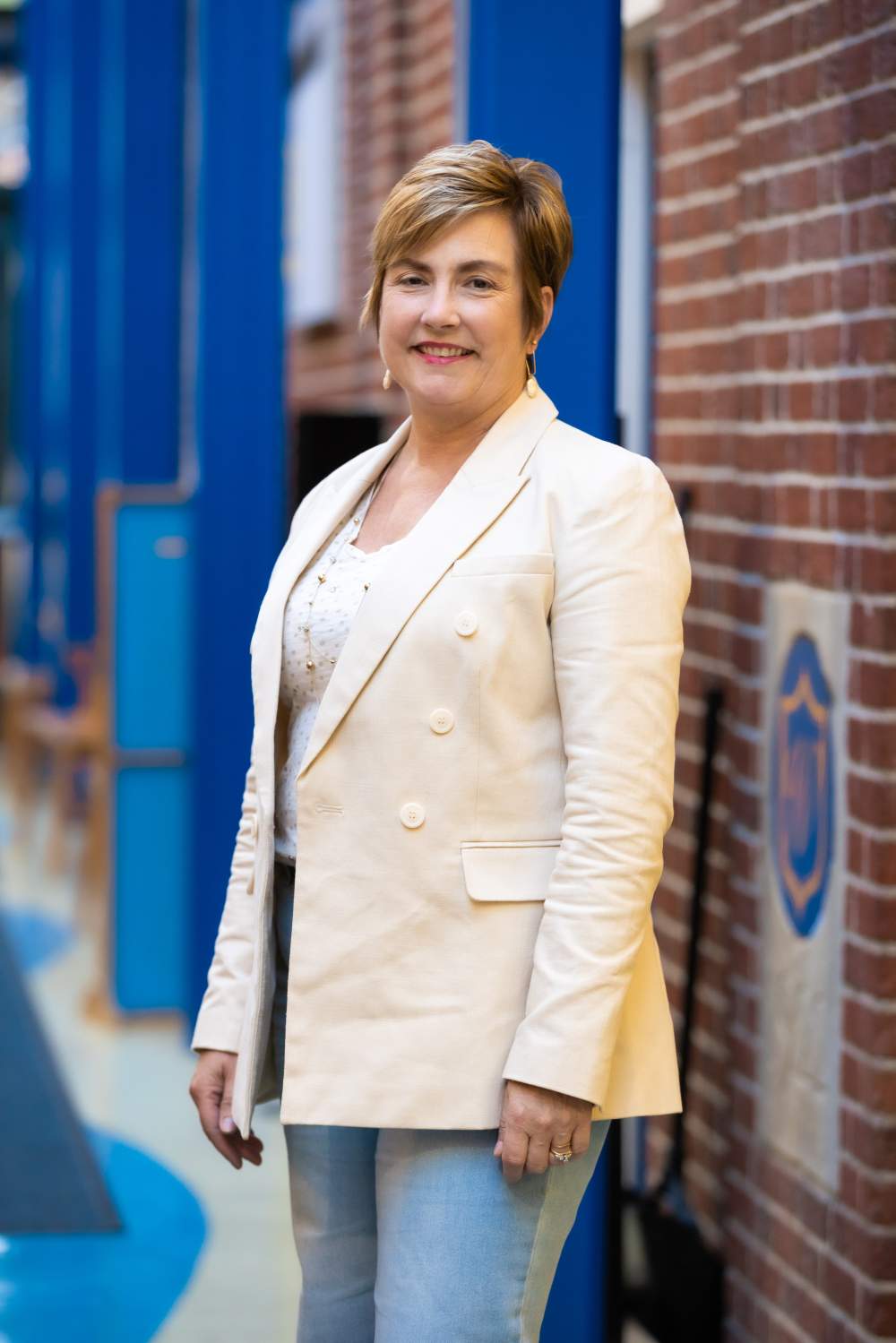 Photo of Pamela Fekete in school foyer