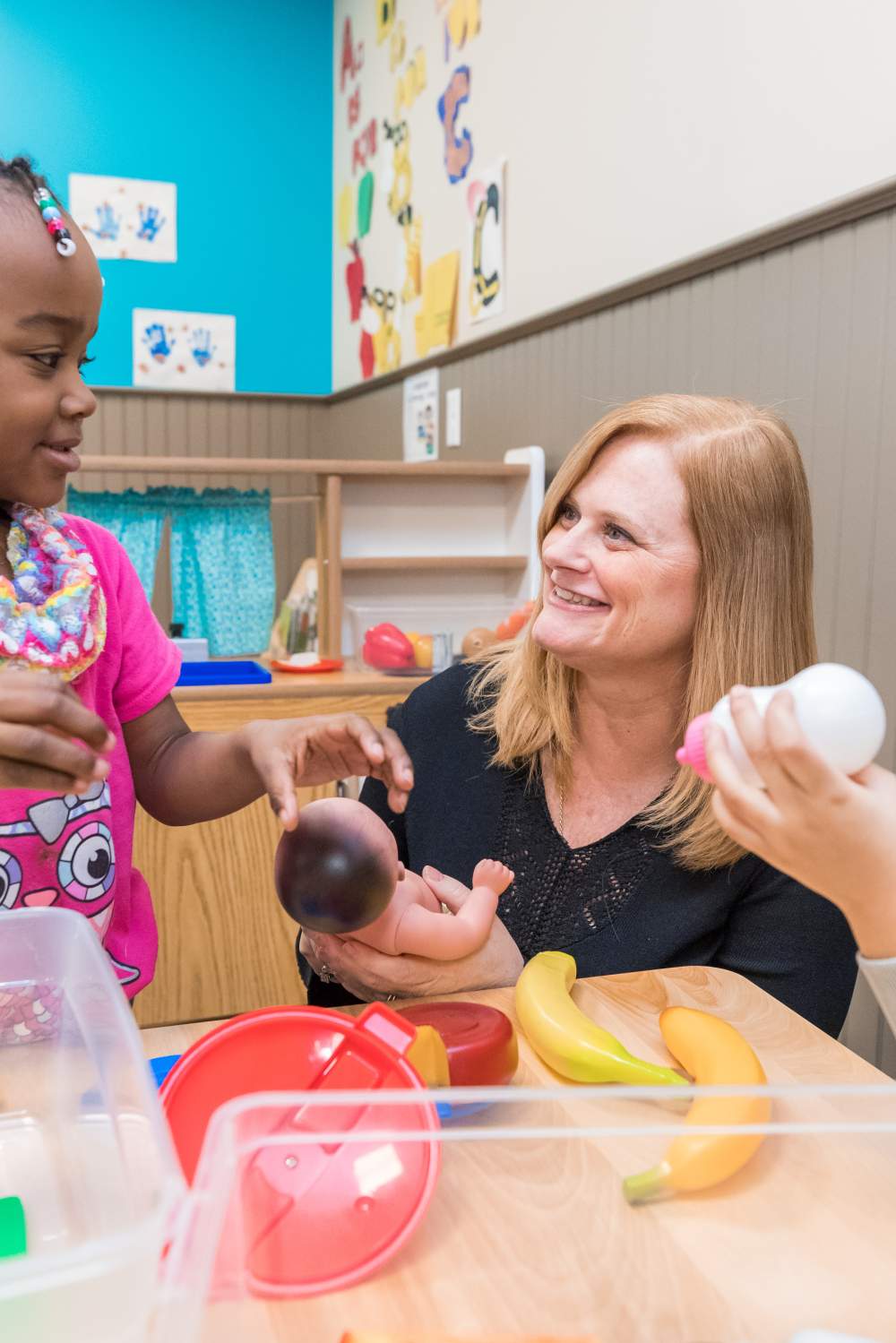 Photo of Tracy Wisner with student