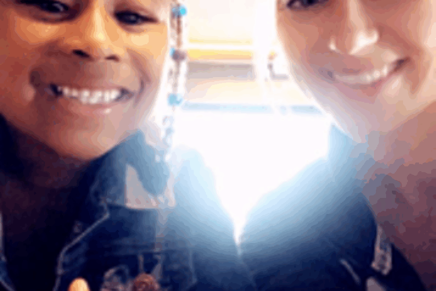 Photo of student and teacher