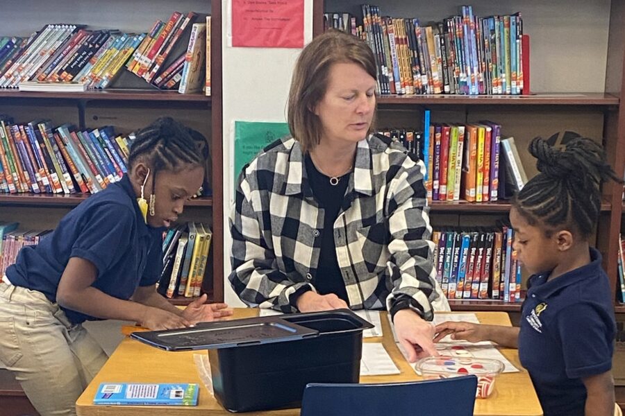 Students working with teacher at Westminster