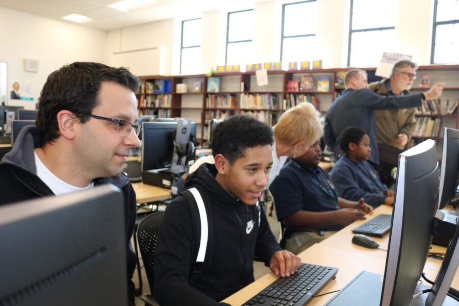 Students on computers for coding club